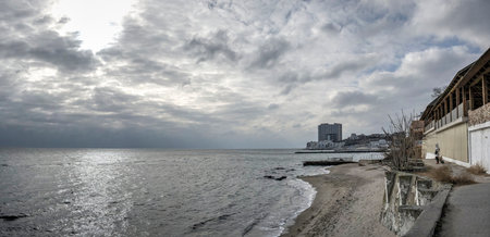Odessa, Ukraine 07.02.2023. Arcadia city beach in Odessa, Ukraine, on a gloomy winter dayのeditorial素材
