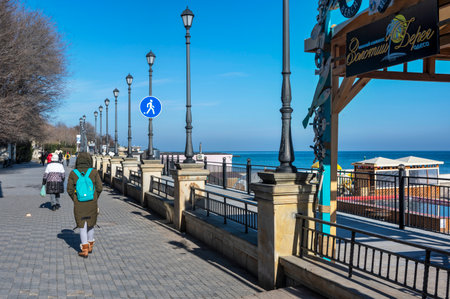Odessa, Ukraine 10.02.2023. Golden beach promenade in Odessa on a sunny winter dayのeditorial素材