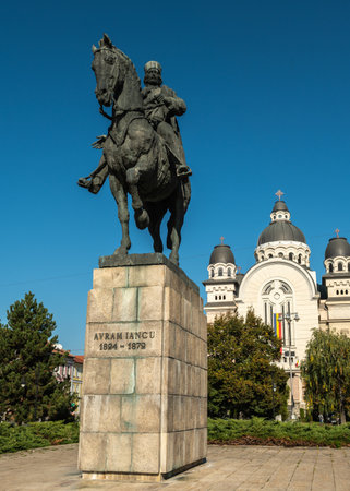 Targu Mures, Romania - October 17.2025. the bronze equestrian statue of Romanian national hero Avram Iancu against a clear blue sky in Targu Muresのeditorial素材