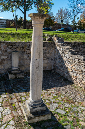 Alba Iulia, Romania - October 19.2025. An outdoor archaeological site featuring exposed stone and red brick foundations of ancient Roman structures within the Alba Carolina fortress in Alba Iulia, Romaniaのeditorial素材