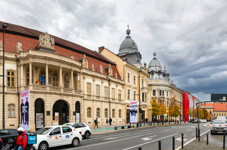 Cluj-Napoca, Romania - October 18.2025. A scenic view of elegant historic buildings with silver...