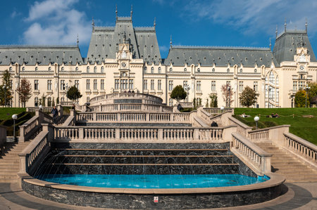 Iasi, Romania - October 23.2025. the Neo-Gothic Palace of Culture in Iasi Romania featuring the lush...