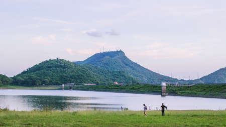 Relaxing time with maintain view at the reservoirの写真素材