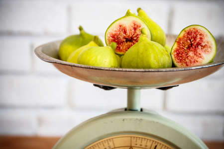 Vintage scale and figs still lifeの写真素材