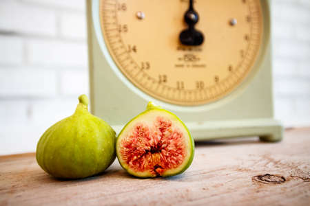 Vintage scale and figs still life