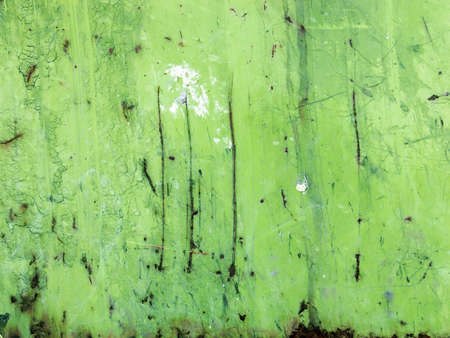 Rusty metal - weathered grainy surface with scratching                   の写真素材