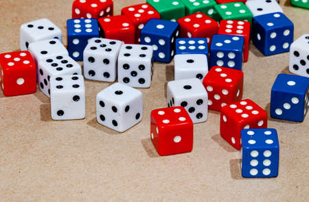 Selection of colored playing dice with copy spaceの写真素材
