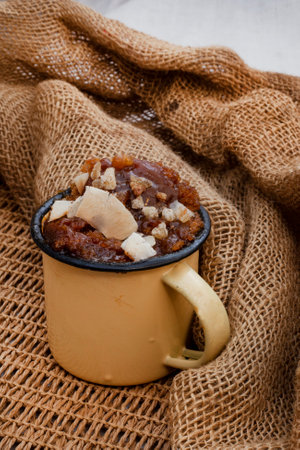 Ginger and Caramel warm pudding with roasted coconut sprinkle
