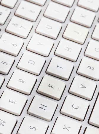 Non-fungible token or NFT concept, NFT spelled out on computer keyboardの写真素材