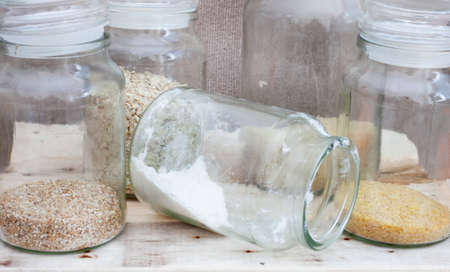 Glass jars with basic pantry stock almost finishedの写真素材
