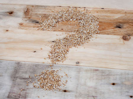 question mark of grains depicting uncertainty of food security