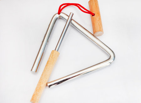 Small musical triangle isolated on a white background with copy spaceの写真素材