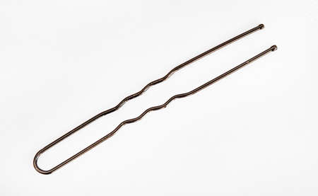 Close up of hair pins or bobby pins, isolated on whiteの写真素材