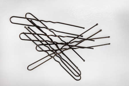 Close up of hair pins or bobby pins, isolated on white