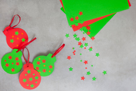Christmas Bauble craft for kids, green and red carboardの写真素材