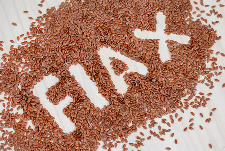 Flax seeds forming the word flaxの写真素材