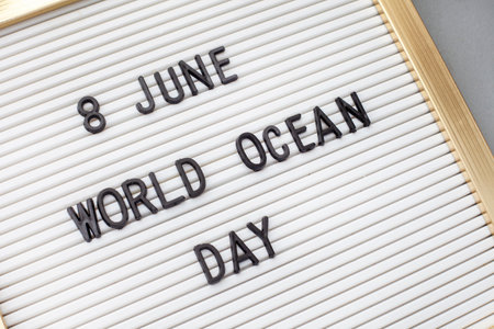 world ocean day 8 June on letterboard with grey backgroundの写真素材