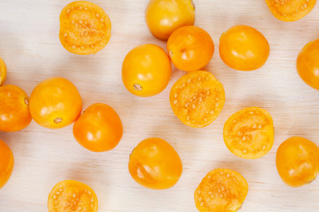Cape gooseberry (Physalis peruviana) on wooden backgroundの写真素材