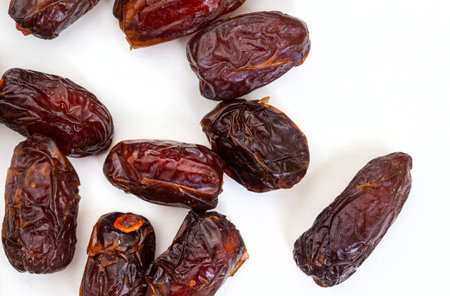Date fruits isolated on white background. Top view. Flat lay.の写真素材