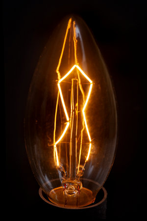 Light bulb on black, South Africa in Electricity disasterの写真素材
