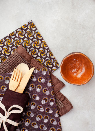 African themed table setting. Brown traditional South African Shwe Shwe clothの写真素材