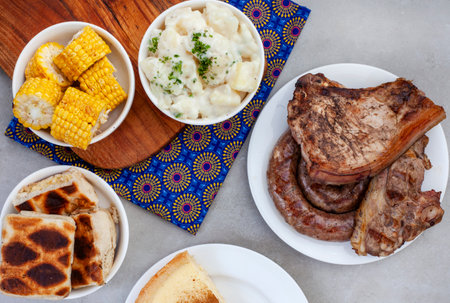 South African Braai Day or Heritage Day. Celebrating traditional braai food.
Meat and sides with...