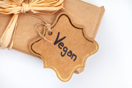 Gift tag with the word VEGAN on a white backgroundの写真素材