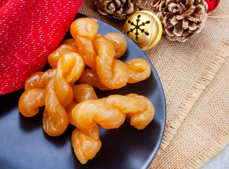 Traditional South African koeksister, sweet treats on festive Christmas table.
Perfect traditional Christmas treatの写真素材