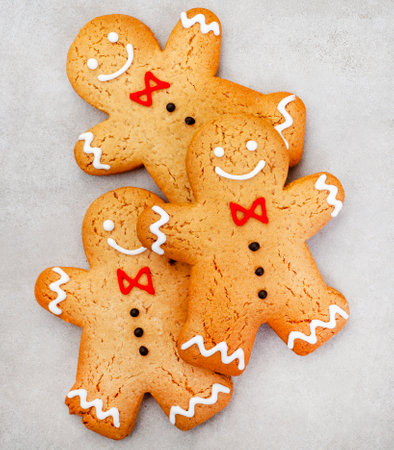 Christmas gingerbread cookies on a light background. Festive food.の写真素材
