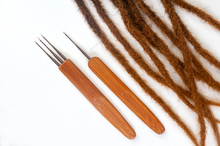 Hair crochet needles for dreadlocks and braids on whiteの写真素材