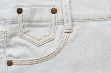 close up detail of white denim trousersの写真素材