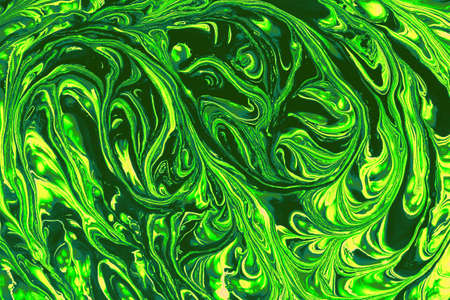 mixing paint green yellow, abstract backgroundの写真素材