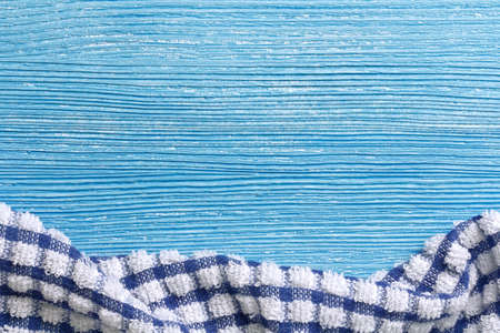 blue wooden background with napkinの写真素材