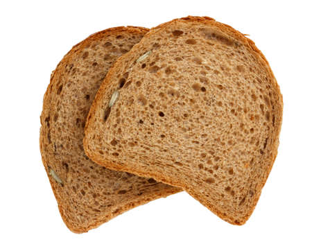 slices of bread with bran and pumpkin seeds isolated on a white background
