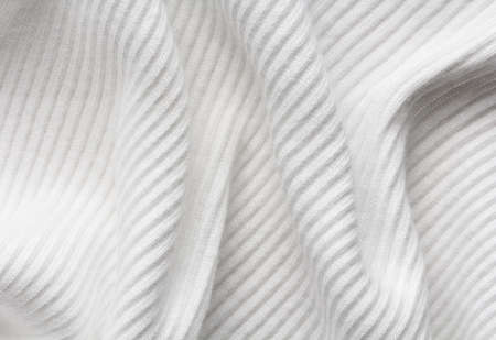 background  of white knitted fabricの写真素材