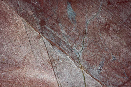 Texture of the surface of the stone with cracks and scratches, grunge effect
