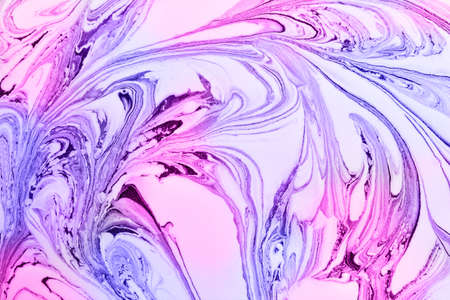 marble texture formed by mixing  colorful bright ink, abstract backgroundの写真素材