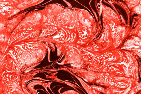 fantastic patterns obtained by mixing red paint white, abstract background