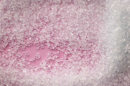 Sugar crystals on a pink background, food texture, macroの写真素材