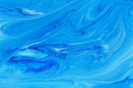 Abstract background of mix blue paintsの写真素材