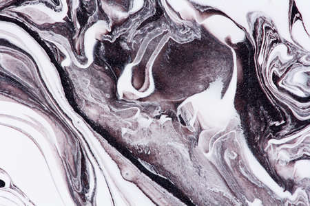marble texture formed by mixing  colorful  paints, abstract background