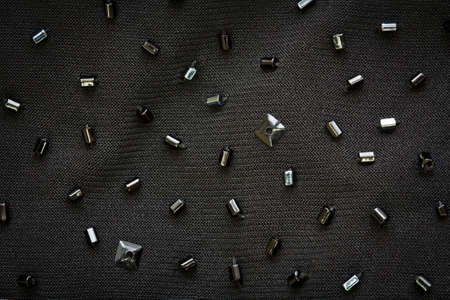 Black fabric for evening dress, embroidered with bugles and paillettes by hand