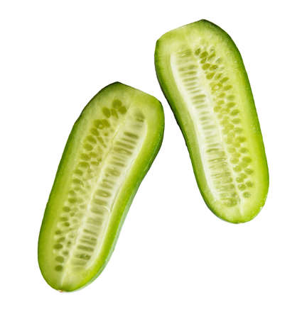 fresh cucumber cut into two halvesの写真素材