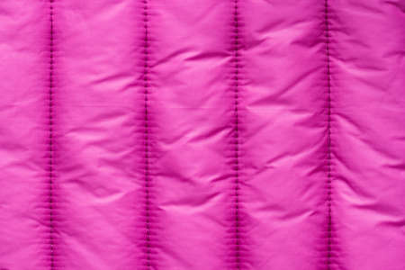 Fragment of an autumn coat, texture, textile backgroundの写真素材