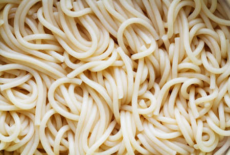 boiled spaghetti as backgroundの写真素材