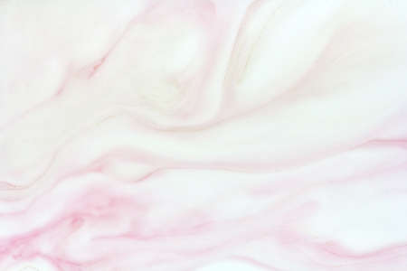 delicate marble background in pink colors, mix of paints