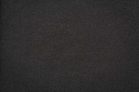 texture of black knit fabric macro, textile background