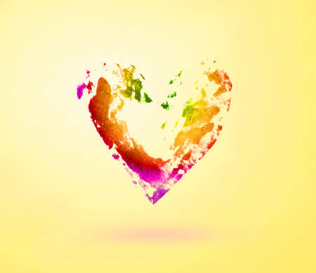 colorful print of the heart on a bright yellow backgroundの写真素材