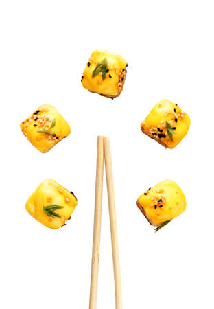 sushi rolls with cheese, sesame  isolated on white backgroundの写真素材