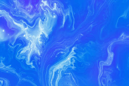 Abstract fantasy blue background of a mix color paintsの写真素材